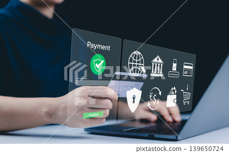 Secure Online Payment Transaction Process concept. A person confirming secure online payment using a credit card through a digital interface with a verification tick symbol. Internet banking, fintech, Secure Online Payment Transaction Process concept. A person confirming secure online payment using a credit card through a digital interface with a verification tick symbol. Internet banking, fintech, 139650724