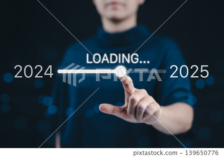 Progress and transition from 2024 to 2025 concept. A woman pointing to loading bar transitioning from 2024 to 2025, progress, future planning, and new year goals. annual planning and business growth. Progress and transition from 2024 to 2025 concept. A woman pointing to loading bar transitioning from 2024 to 2025, progress, future planning, and new year goals. annual planning and business growth. 139650776