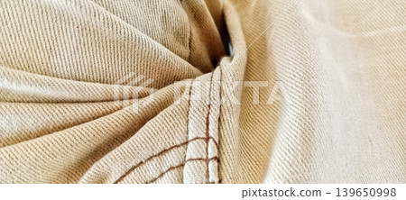 Denim fabric texture with stitching 139650998