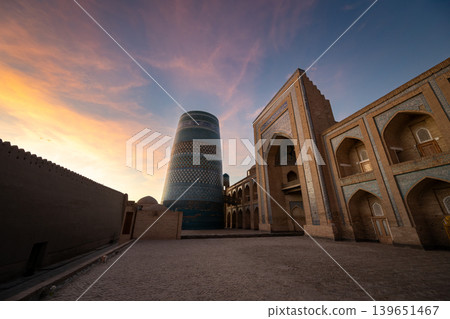 Ichan Kala, a UNESCO World Heritage Site in Khiva, Uzbekistan: Sunrise and panoramic view of the ancient city Ichan Kala, a UNESCO World Heritage Site in Khiva, Uzbekistan: Sunrise and panoramic view of the ancient city 139651467