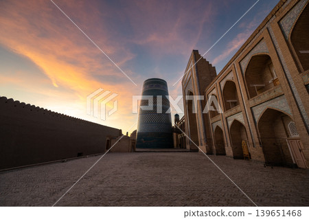 Ichan Kala, a UNESCO World Heritage Site in Khiva, Uzbekistan: Sunrise and panoramic view of the ancient city Ichan Kala, a UNESCO World Heritage Site in Khiva, Uzbekistan: Sunrise and panoramic view of the ancient city 139651468
