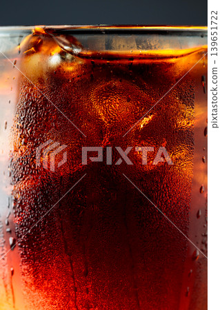 Fizz sparkling cola bubbly soda pop with ice cubes. Fizz sparkling cola bubbly soda pop with ice cubes. 139651722