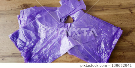 Plastic bags contribute to pollution and harm the planet's environment daily 139652941