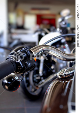 Control Buttons On A Chrome Motorcycle Handlebar At Motorbike Showroom Control Buttons On A Chrome Motorcycle Handlebar At Motorbike Showroom 139653032