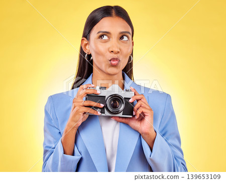 Pouting, thinking and a woman with a camera on a yellow background for a photography idea. Happy, photographer or a person with gear for paparazzi, press or a journalist employee for pictures Pouting, thinking and a woman with a camera on a yellow background for a photography idea. Happy, photographer or a person with gear for paparazzi, press or a journalist employee for pictures 139653109