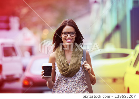 Happy, woman and portrait of coffee break in city, street or outdoor on holiday or vacation in summer. Takeaway, tea and college student walk in town with beverage in a cup and freedom on adventure Happy, woman and portrait of coffee break in city, street or outdoor on holiday or vacation in summer. Takeaway, tea and college student walk in town with beverage in a cup and freedom on adventure 139653207