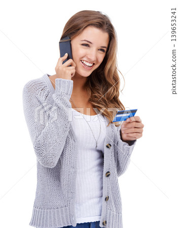 Woman, credit card and phone call for transaction, investment and online payment for purchase in studio. Female person, ecommerce and promotion on technology, customer experience and white background 139653241