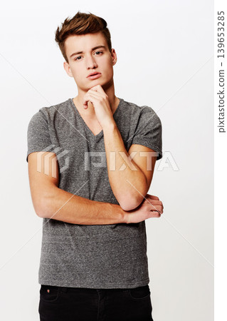 Fashion, portrait and man thinking in studio with planning, expression or gesture on white background. Face, attitude or male model with why, questions or brainstorming, emoji or problem solving Fashion, portrait and man thinking in studio with planning, expression or gesture on white background. Face, attitude or male model with why, questions or brainstorming, emoji or problem solving 139653285