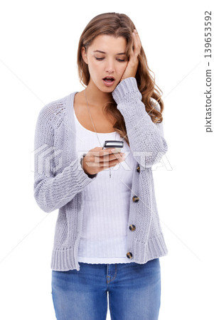 Confused, stress and woman with phone in studio for social media, notification or hacker on white background. Smartphone, anxiety and female model with app alert for cybersecurity fail, 404 or glitch Confused, stress and woman with phone in studio for social media, notification or hacker on white background. Smartphone, anxiety and female model with app alert for cybersecurity fail, 404 or glitch 139653592