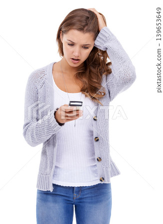 Stress, confused and woman with phone in studio for social media, notification or hacker on white background. Smartphone, anxiety and female model with app alert for cybersecurity fail, 404 or glitch Stress, confused and woman with phone in studio for social media, notification or hacker on white background. Smartphone, anxiety and female model with app alert for cybersecurity fail, 404 or glitch 139653649