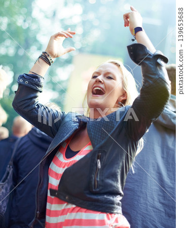 Woman, dance and cheering outdoor at music festival for freedom, performance and entertainment with crowd. Person, happy or shouting at event, concert or show with audience in nature for summer party Woman, dance and cheering outdoor at music festival for freedom, performance and entertainment with crowd. Person, happy or shouting at event, concert or show with audience in nature for summer party 139653688