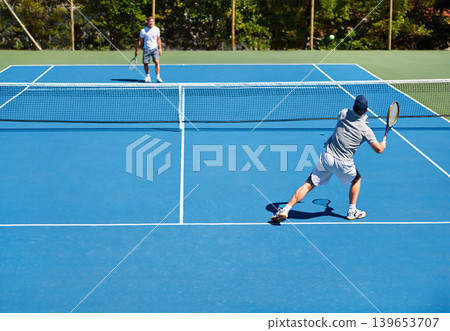 Tennis, match and men with fitness, sports and competition with training and cardio with a game. Players, friends and guys with rackets and court with workout and sunshine with challenge and practice 139653707