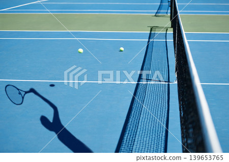Shadow figure, tennis and player on a court, fitness and sunshine with competition and hobby. Person, outdoor and athlete with exercise and workout with training and activity with game and sports Shadow figure, tennis and player on a court, fitness and sunshine with competition and hobby. Person, outdoor and athlete with exercise and workout with training and activity with game and sports 139653765