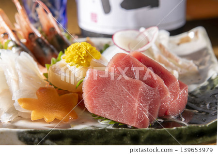 A close-up of fresh tuna sashimi - fatty red meat ingredients. 139653979