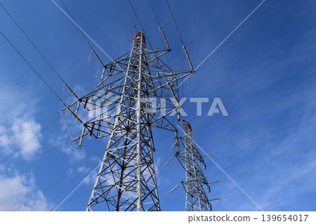 Transmission tower high voltage alternating current Transmission tower high voltage alternating current 139654017