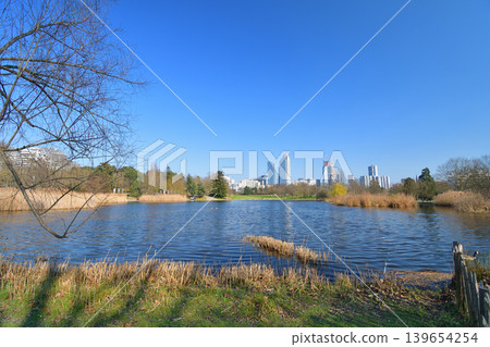 André Malraux Park in the suburbs of Paris with a view of buildings in the distance. French urban landscape (March 7, 2022) André Malraux Park in the suburbs of Paris with a view of buildings in the distance. French urban landscape (March 7, 2022) 139654254