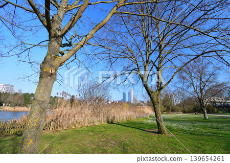 André Malraux Park in the suburbs of Paris with a view of buildings in the distance. French urban landscape (March 7, 2022) André Malraux Park in the suburbs of Paris with a view of buildings in the distance. French urban landscape (March 7, 2022) 139654261