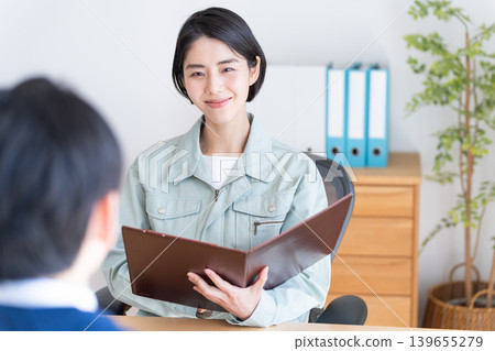 Businessmen in work clothes having a meeting Businessmen in work clothes having a meeting 139655279