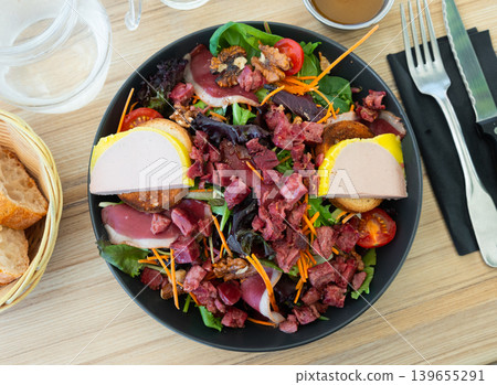 Just cooked portion of french perigord salad Just cooked portion of french perigord salad 139655291