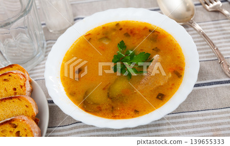 Popular dish of Russian cuisine is Pickle soup 139655333