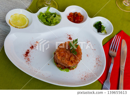 Plate of delicious salmon tartar Plate of delicious salmon tartar 139655613
