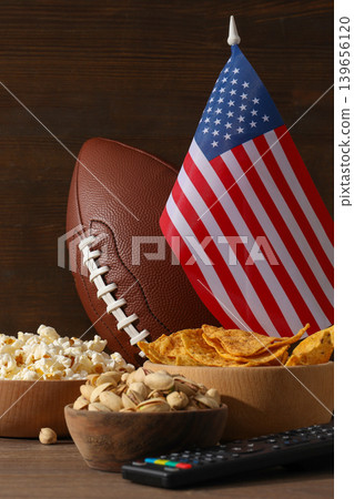 Snack items are prepared for watching a football game with decor Snack items are prepared for watching a football game with decor 139656120