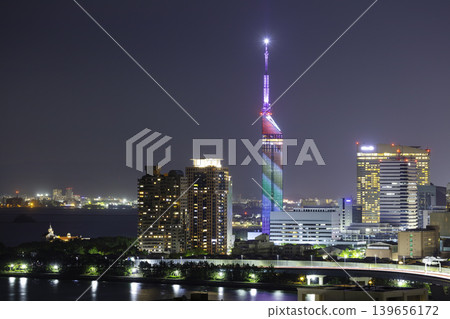 Beautiful night view of Fukuoka: Fukuoka Tower shines in rainbow colors. Beautiful night view of Fukuoka: Fukuoka Tower shines in rainbow colors. 139656172