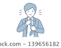 A businessman adjusts his tie to get himself motivated. 139656182
