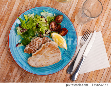 Tuna fillet platter with vegetable salad Tuna fillet platter with vegetable salad 139656344