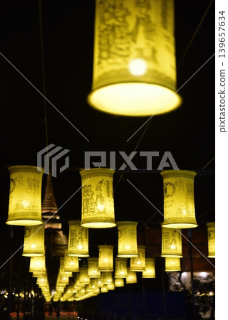 Beautiful Traditional Thai Yellow Lanterns Hanging at Night During Loy Krathong Festival Beautiful Traditional Thai Yellow Lanterns Hanging at Night During Loy Krathong Festival 139657634