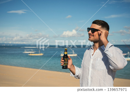 Bali, Indonesia, March 18, 2026: Guinness drink at the beach 139657971