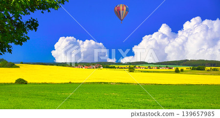 Beautiful rapeseed field and clouds in Bohemia Beautiful rapeseed field and clouds in Bohemia 139657985