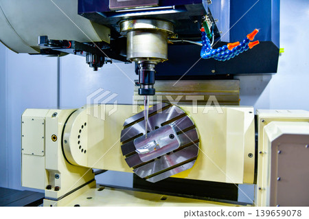 5 Axis CNC milling machine precision manufacturing process, metalworking industry. 5 Axis CNC milling machine precision manufacturing process, metalworking industry. 139659078