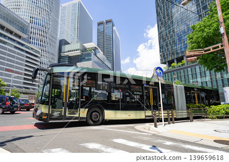 SRT (Smart Roadway Transit) running in front of Nagoya Station SRT (Smart Roadway Transit) running in front of Nagoya Station 139659618
