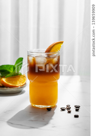 Cold bumble coffee with orange juice and ice Cold bumble coffee with orange juice and ice 139659909