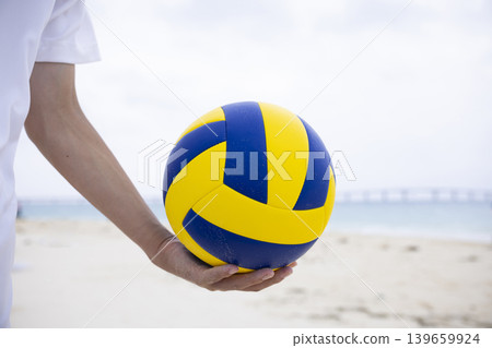 Enjoying beach volleyball Enjoying beach volleyball 139659924
