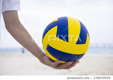 Enjoying beach volleyball Enjoying beach volleyball 139659926