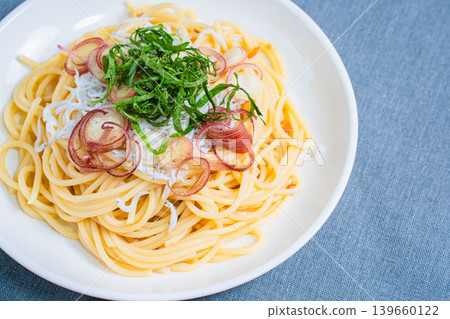 Shirasu pasta: Japanese-style spaghetti topped with shiso leaves and Japanese ginger. Shirasu pasta: Japanese-style spaghetti topped with shiso leaves and Japanese ginger. 139660122