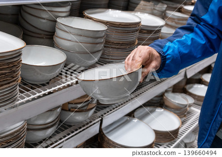 Boxes of white plates in crockery shop, dishware, tableware stack in store Boxes of white plates in crockery shop, dishware, tableware stack in store 139660494