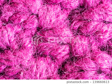 Knitted woolen fabric pattern in rich magenta Knitted woolen fabric pattern in rich magenta 139660613