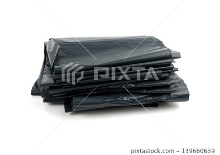 Garbage Bag Isolated. Folded Trash Package, New Rolled Plastic Bin Bags, Black Polyethylene Container Garbage Bag Isolated. Folded Trash Package, New Rolled Plastic Bin Bags, Black Polyethylene Container 139660639