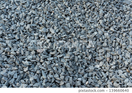 Construction gravel pattern, crushed grey stone textured background Construction gravel pattern, crushed grey stone textured background 139660640