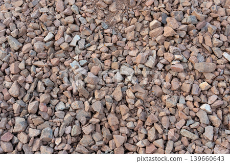 Construction gravel pattern, crushed grey stone textured background Construction gravel pattern, crushed grey stone textured background 139660643