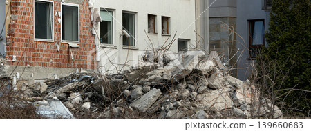 Broken rubble and concrete wall textured background Broken rubble and concrete wall textured background 139660683