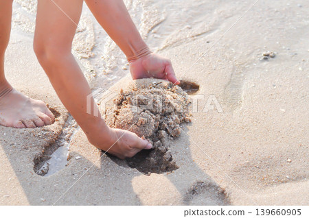 sand, holding sand or beach sand or sea sand or play sand sand, holding sand or beach sand or sea sand or play sand 139660905