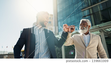 Business men, fist bump and team in street with smile, support and respect on walk to investment company. Partnership, friends and staff with hello, happy and commute on city sidewalk in Cape Town Business men, fist bump and team in street with smile, support and respect on walk to investment company. Partnership, friends and staff with hello, happy and commute on city sidewalk in Cape Town 139661009