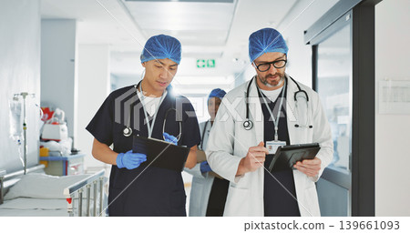 Teamwork, talking and doctors with a tablet at a hospital for health advice or surgery communication. Help, clinic and medical employees speaking with technology, planning and schedule for nursing 139661093