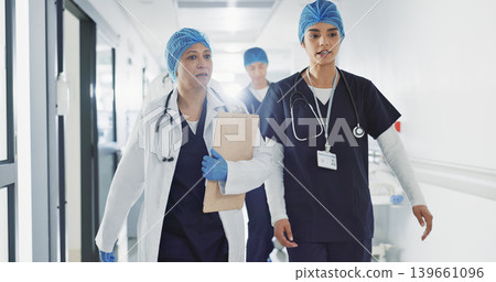 Doctors, nurses and women walking, talking and planning healthcare, clinic management and workflow schedule. Medical worker, surgeon and mentor support, hospital teamwork and folder or patient charts Doctors, nurses and women walking, talking and planning healthcare, clinic management and workflow schedule. Medical worker, surgeon and mentor support, hospital teamwork and folder or patient charts 139661096