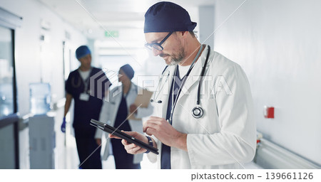 Man, doctor and tablet for hospital, healthcare or clinic research, online planning and schedule management. Medical professional or surgeon typing on digital technology for surgery results or data 139661126