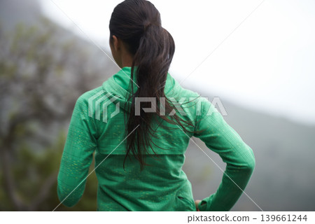 Back, road and running with woman, energy and morning with endurance and exercise for health, wellness and cardio. Person, runner or athlete with workout or training with nature, morning or challenge Back, road and running with woman, energy and morning with endurance and exercise for health, wellness and cardio. Person, runner or athlete with workout or training with nature, morning or challenge 139661244